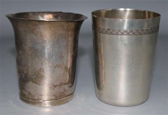An late 18th century continental unmarked silver beaker and an early 20th century Egyptian silver beaker, 6.5 oz.
